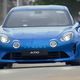 The Alpine A110 squatting under heavy braking up the hill at Goodwood.